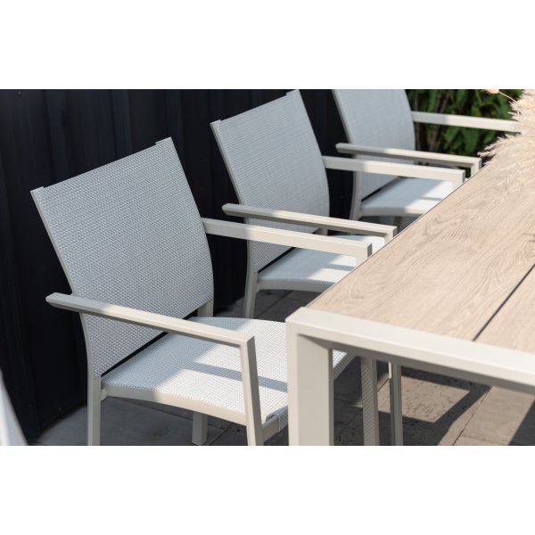 Urbanite eetgroep met eettafel 207 cm en 8 stapelbare eetkamerstoelen - Beige Urbanite eetgroep met eettafel 207 cm en 8 stapelbare eetkamerstoelen - Beige