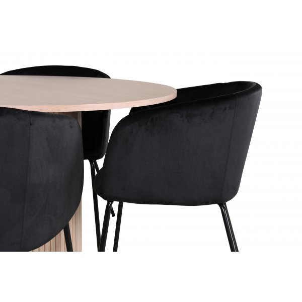 Bianca Matgrupp runt vitputsat matbord med 4 st Berit svart stolar