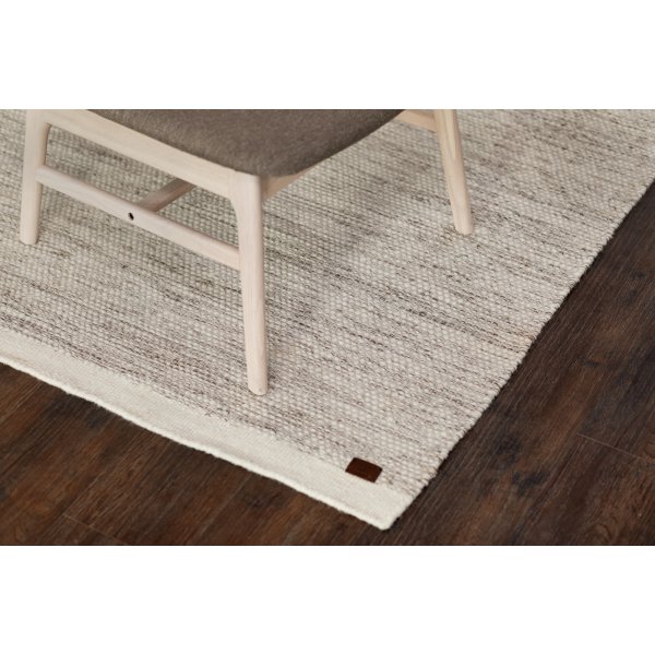 Tapis tuft en laine tiss main Crme