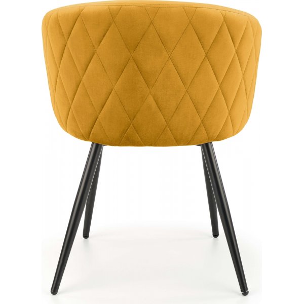 Fauteuil jaune avec pieds noirs