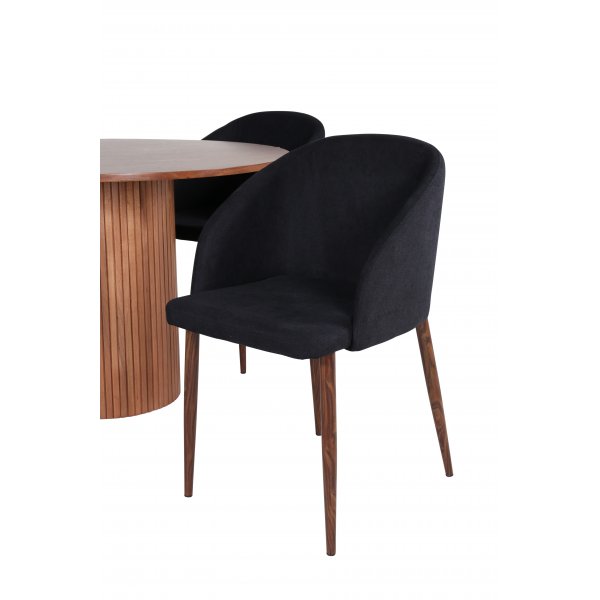 Bianca Matgrupp runt valnöt matbord med 4 st Arch svart stolar Bianca Matgrupp runt valnöt matbord med 4 st Arch svart stolar